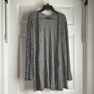 Ambiance long sweater with splits on the sides. Size small.